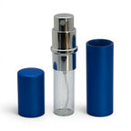 Travel sprayer disassembled showing the glass inner vial