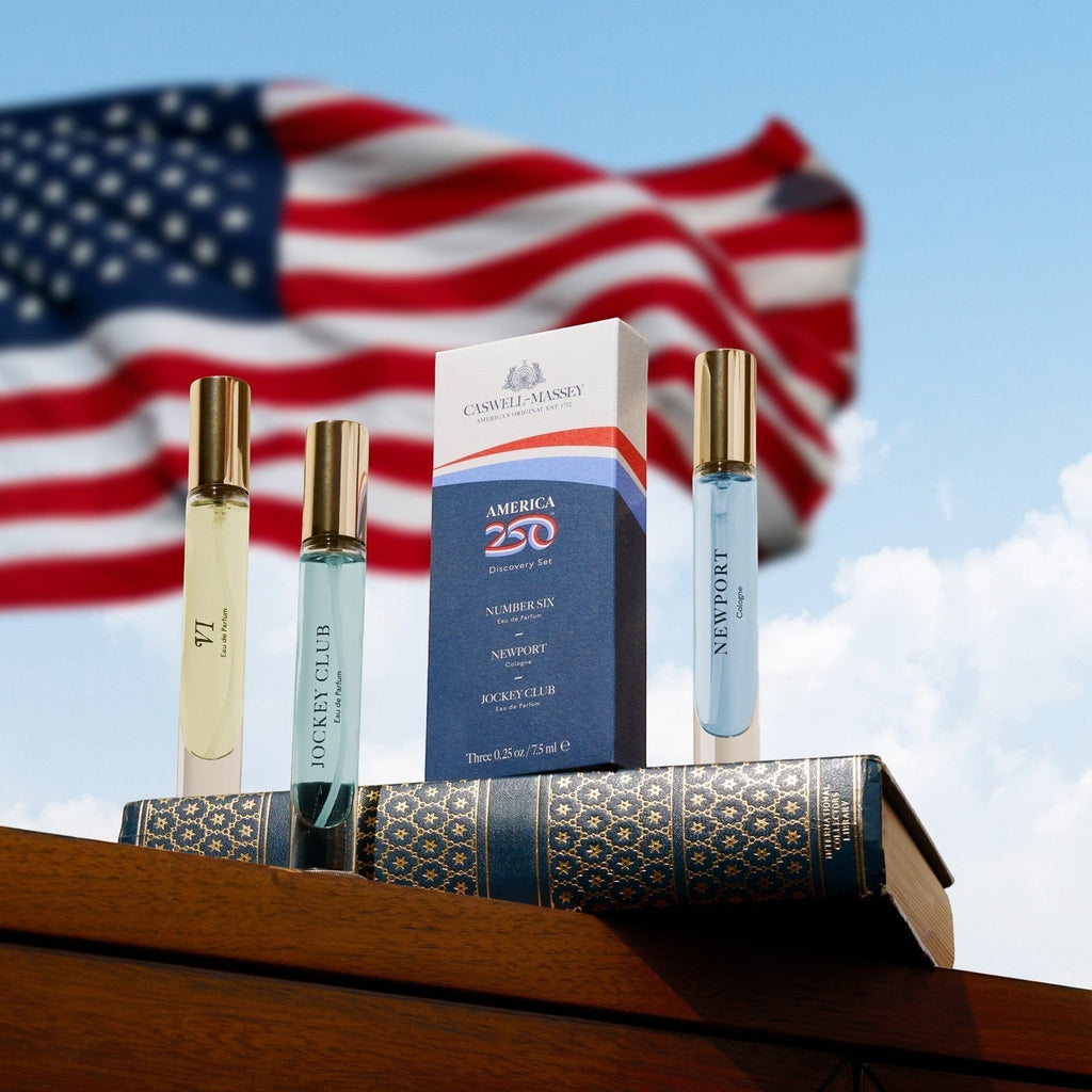 Caswell-Massey America250 Discovery Set staged with US flag
