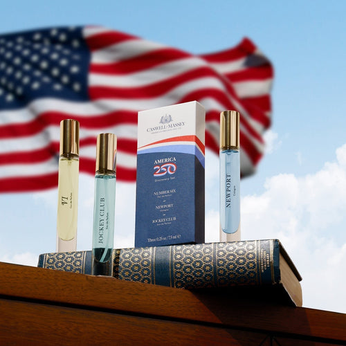 Caswell-Massey America250 Discovery Set staged with US flag