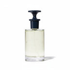 CRYOGEAR Caswell-Massey Heritage 2571 Eau de Parfum in a clear glass bottle with a dark blue stopper.